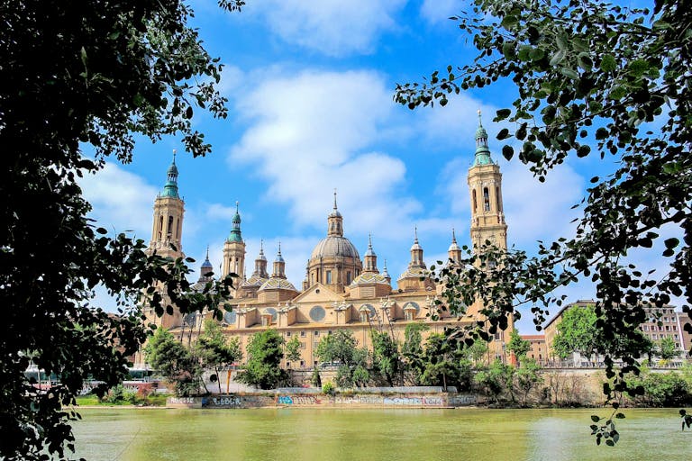 Cathedral with Dome Roof Near a Body of Water